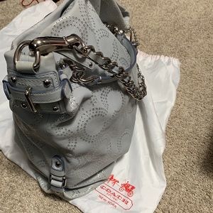 Coach bag with metal accents